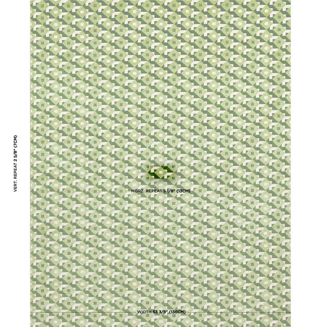 An all-over three-color geometric in verdant reminiscent of Op Art patterns is rendered in cushy cut velvet to create a...