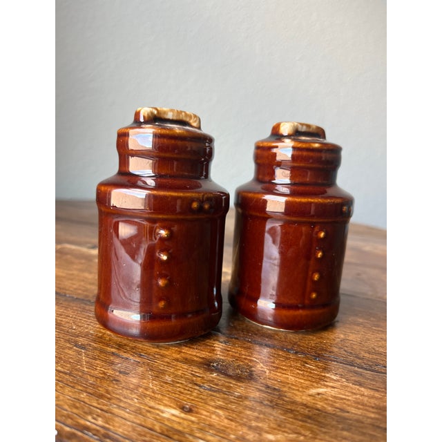 Brown glazed milk can design salt and pepper shaker Marked USA at the bottom Mccoy Pottery 2.25” bottom diameter, 4”...
