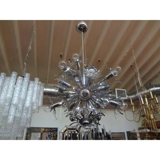 Italian Mid-Century Modern chrome Sputnik chandelier or pendant in the style of Gaetano Sciolari or Stilnovo, circa 1960....