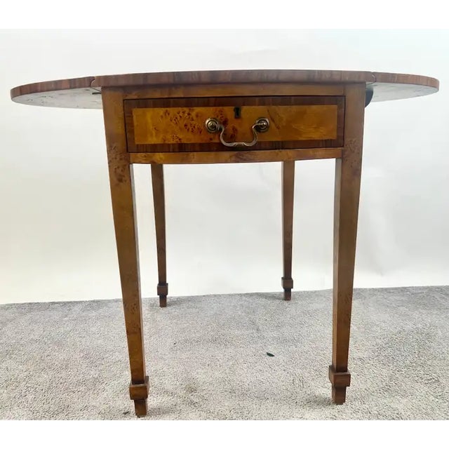 English George III Style Pembroke Burl Wood Table w Twin Drop-leaf Sides This elegant George III style Pembroke table is a...