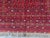 High Quality Red Afghan Mauri Hand-Knotted Wool Rug - 6' X 9'8" For Sale - Image 6 of 10