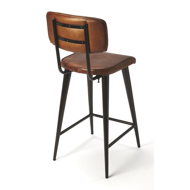 Reminiscient of retro leathers; this bar stool brings a rustic glam to your kitchen, bar or pub ensamble. Comfortable...