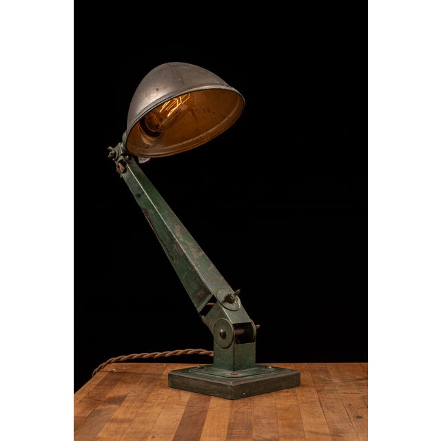 Early 20th-century industrial task lamp manufactured by American Fixture Co. of Milwaukee, Wisconsin. Constructed from...
