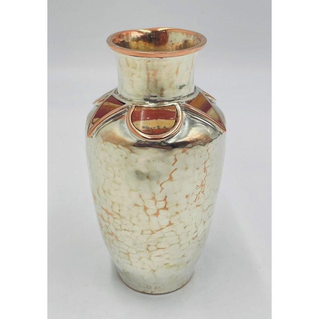 A finely crafted vintage vase designed and manufactured in Taxco, Mexico by celebrated artist Emilia Castillo. This...