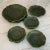 20 pieces of Metlock Potteries fabulous “Lotus” dinnerware service in dark green. Set includes one XL serving bowl 16.5”,...
