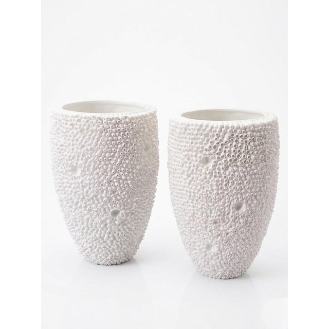 Evoke the organic beauty of the Mediterranean with this exquisite pair of recently made Italian ceramic vases. Hand-...