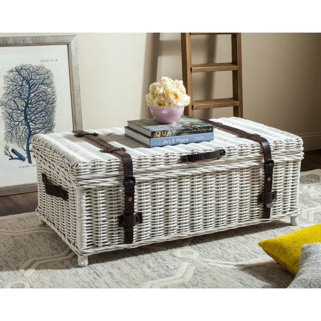 Brim With vintage charm, this white rattan coffee table serves double duty as a pretty piece of furniture. Designed with...