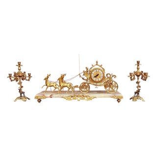 Early 20th Century Carriage Clock With Deer And Candlesticks In Gilt Bronze For Sale
