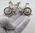 This Italian silver miniature is a delightful and intricate representation of a classic tandem bicycle, masterfully...