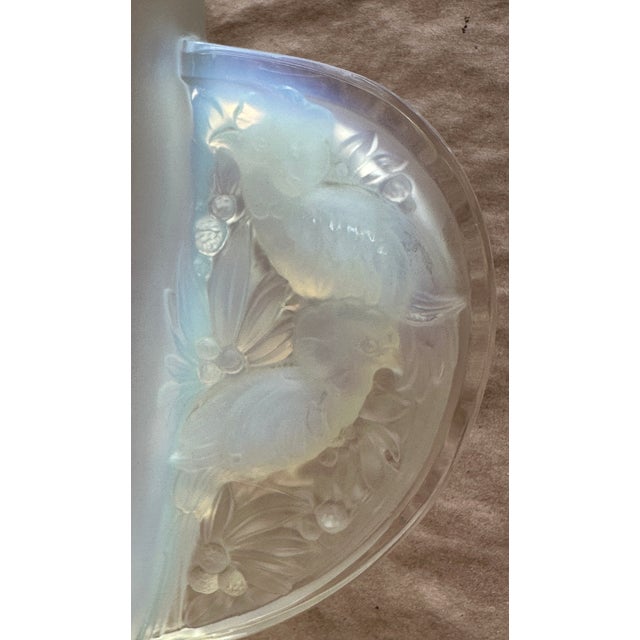 Here we have a french art deco blue tint bird handled vase , detailed birds in the handles , signed on base , a flea bite...