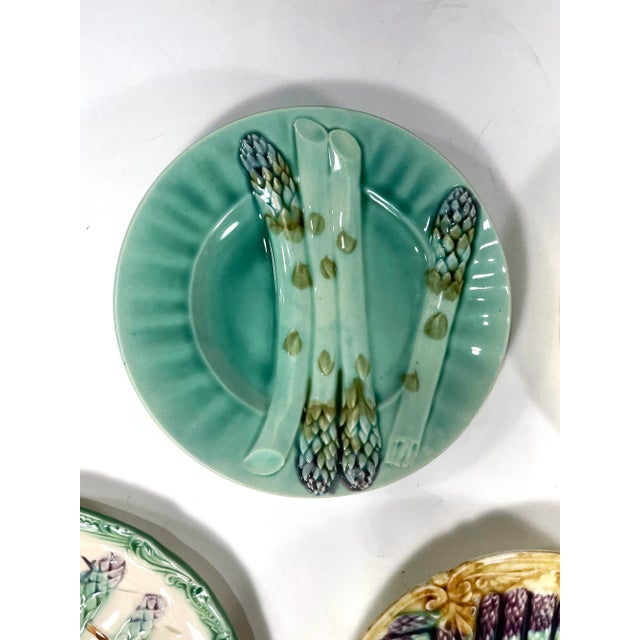 A beautiful collection of five antique French asparagus plates Clockwise, starting upper left: Turquoise - marked "Depose...