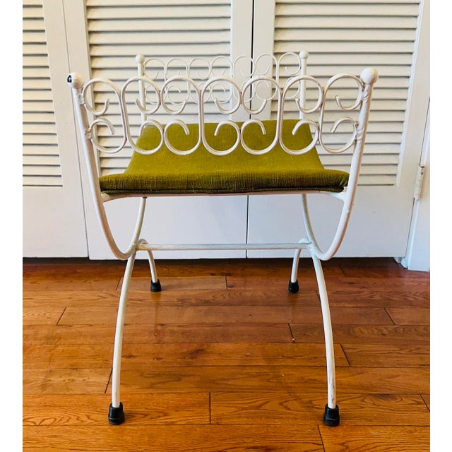 Part of Umanoff's "Granada Group" for Shaver Howard, this rare "Princess Bench" features the signature scroll work at the...