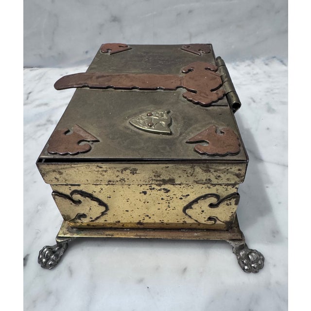Metal Mid 20th Century Brass Trinket Box With Buckle and Lion Crest Design For Sale - Image 7 of 11