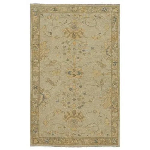 This elegant small Oushak rug is a celebration of Turkish weaving tradition in a size perfectly suited for today’s...