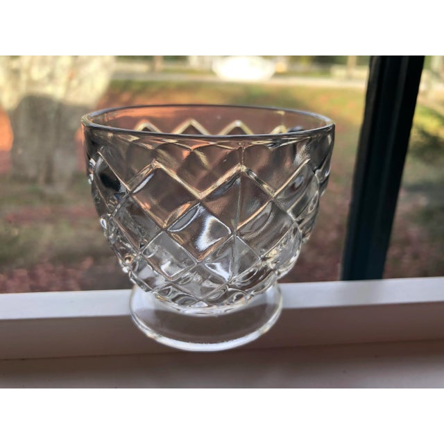 Vintage set of 11 pressed glass footed punch cups 2.5"H X 3"D, No makers mark in excellent condition.