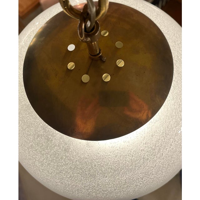 Vintage pulegos hand blown glass bowl with new metal fitting, rewired. This piece is designed in the style of the selected...