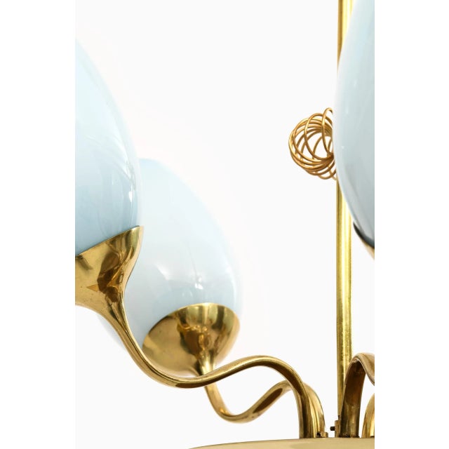 Rare ceiling lamp model 9029 designed by Paavo Tynell. Produced by Taito Oy in Finland. Wear consistent with age and use....