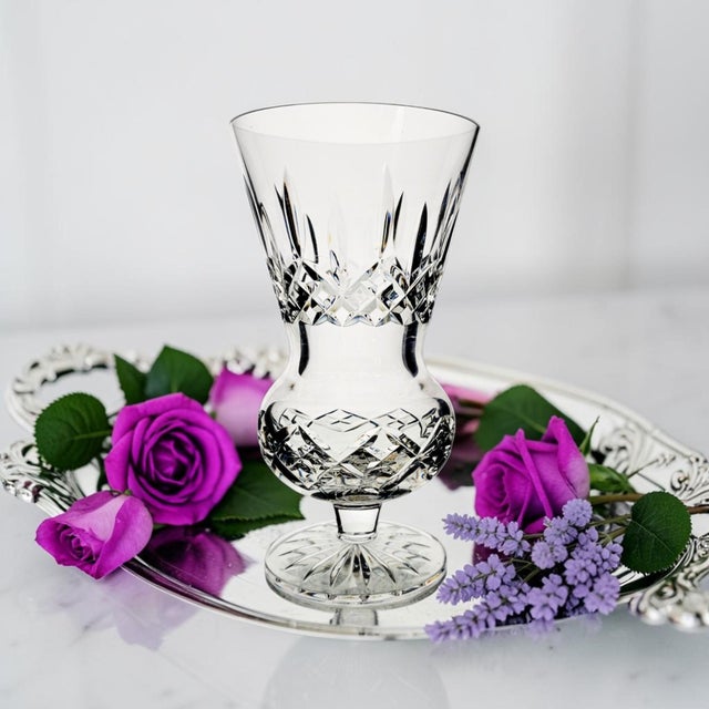 A Waterford Crystal Lismore Thistle vase, handcrafted in Ireland and produced circa 1995–2005. Designed in the iconic...