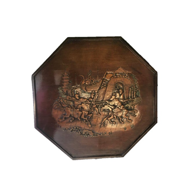 Wooden carved and hand carved and hand tinted octagonal side table circa 1960's - 1970's. Table has a hinged door with...
