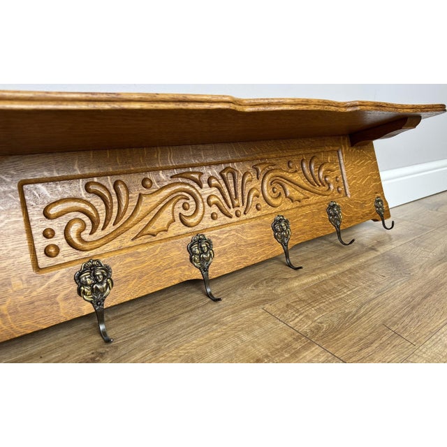 Bring classic French character to your hallway or entrance with this elegant Vintage French Oak wall coat hanger ....