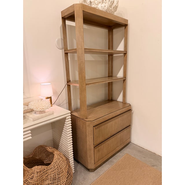 This is a substantial, architectural etagere style storage cabinet with a warm dark blonde wood wire brush finish and...