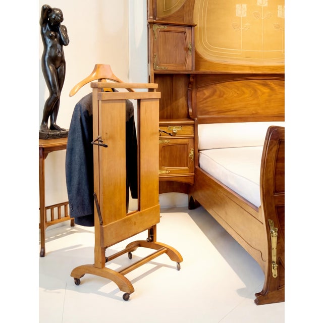 An exceptional Italian mid-century valet stand (gentleman’s butler / dressboy) from the 1950s, crafted in solid wood and...