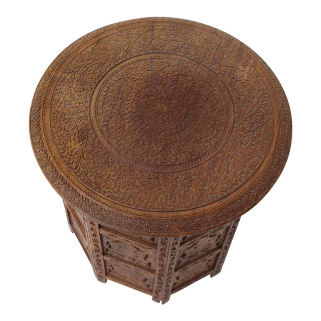 Occasional pierced carving folding centre side table. Made in the mid 20th century.