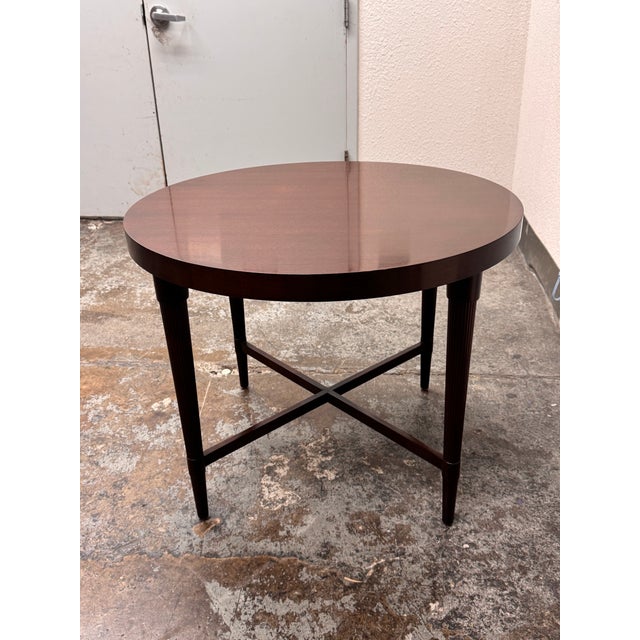 Design Plus Gallery presents the Affinity Table by Barbara Barry for Baker Furniture. This round table has a mahogany...