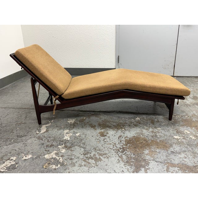 Design Plus Gallery presents Mid 20th Century Lounge by Ib Kofod-Larsen for Selig Furniture. This chaise lounge has a...