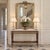 A French Louis XVI mahogany console sofa table elegantly appointed with gilt bronze, crowned by a top of white Carrara...