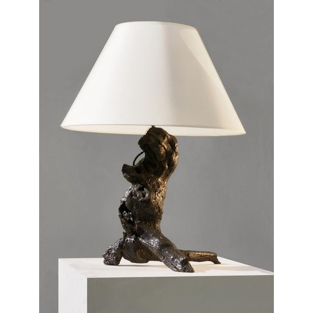 A strong and very dramatic, organic and almost zoomorphic, massive wood table lamp, made by an anonymous french artist...
