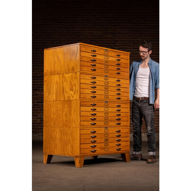 c. 1950s-1960s; Mayline Company, Inc. - Sheboygan, WI Modular four-stack flat file cabinet constructed of oak and designed...
