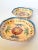 This set is really beautiful with a creamy yellow background and a great flower and border motif in shades of rust, denim...