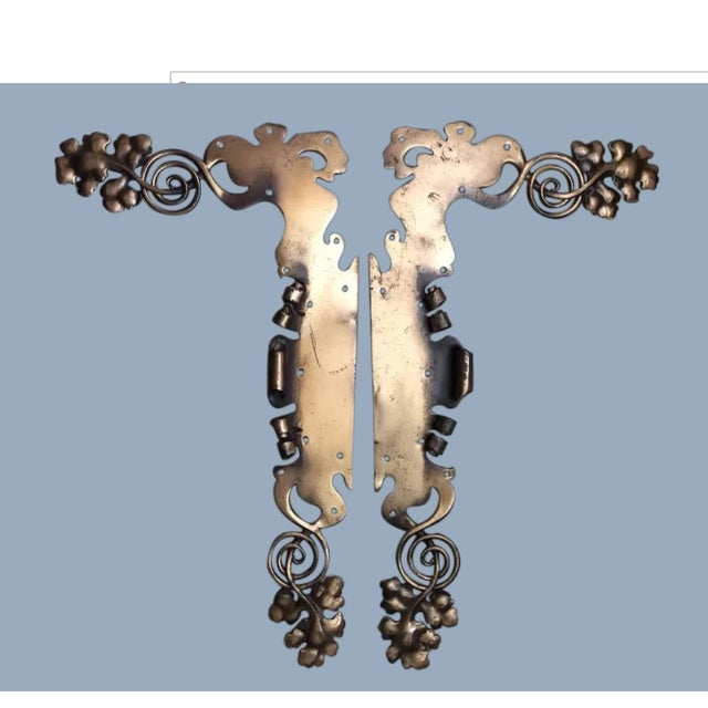 A pair of Antique Art Nouveau Architectural Elements. The Scrolls are hand crafted and are brass or bronze.
