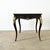 Dimensions: 30 ⅜” H x 53 ½” W x 31 ½” D A dazzling Louis XV style ebonized and brass-inlay desk from 19th century France,...