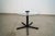 Vintage 1980's Post Modern end table for sale. It has a black metal star base with a round glass top. It's in excellent...