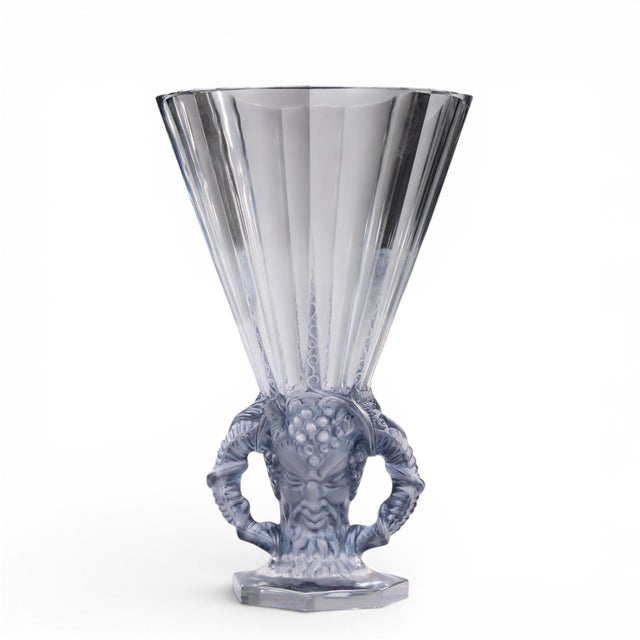 René Lalique 1931 Faune Vase in Clear Crystal with Blue Patina This vase measures: 7.875 wide x 7.875 deep x 12.5 inches...