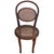 Victorian style child size Thonet number 15 oak side chair features an elegant, sculptural frame crafted from warm-toned...