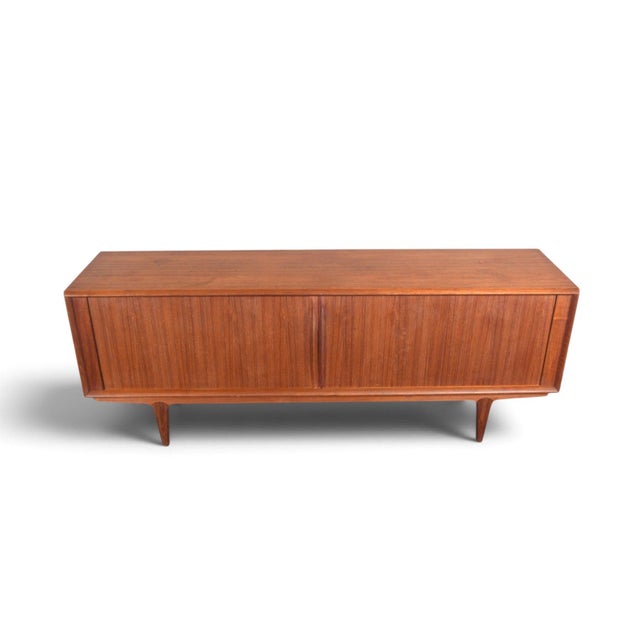 This credenza was designed by Bernhard Pedersen and produced by Bernhard Pedersen and Søn in Denmark during the 1960s. The...