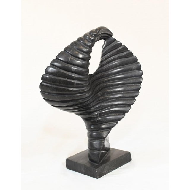 Stunning abstract art statue hand carved from marble Lovely interiors piece and the marble is smooth and chip free. All...