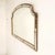 A striking large vintage spanish mirror dating from circa the 1970s, featuring an elegant architectural silhouette and...