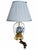 A charming floral table lamp featuring a blue botanical arrangement enclosed within a clear, vase-shaped glass body. Lily-...