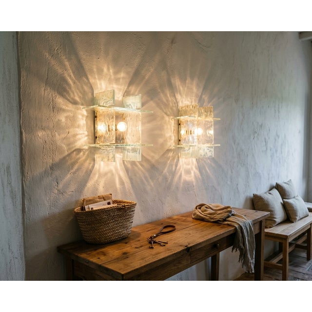 This rare pair of wall or ceiling lights, designed by carlo nason for mazzega in the 1960s, is more than just...