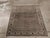 This Mid-20th century Persian Afshar rug, measuring 3' 7" x 4' 10", is a striking example of tribal weaving traditions...