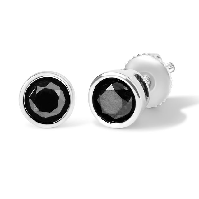 Elegant and timeless, these gorgeous .925 sterling silver solitaire stud earrings feature bold and beautiful heat treated,...