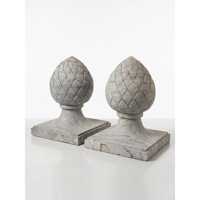 Elevate your garden or grand entryway with this striking pair of vintage Neoclassical finials. Expertly crafted in the...
