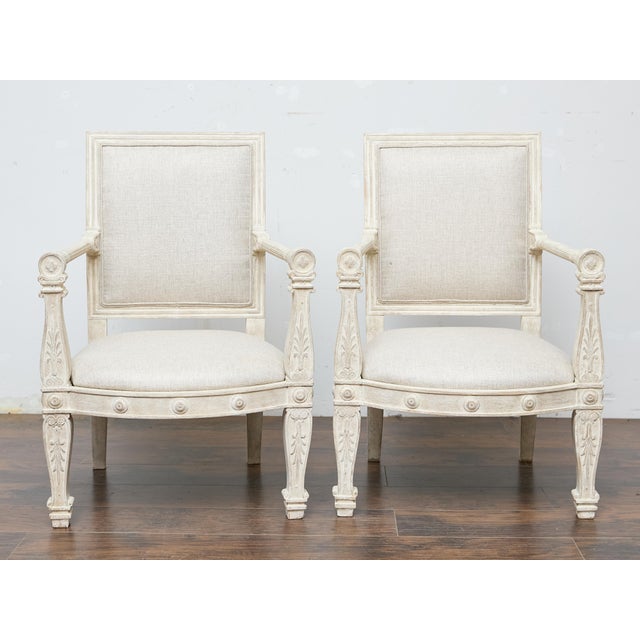 French Pair of French 1920s Painted Armchairs with Carved Details and Linen Upholstery For Sale - Image 3 of 11