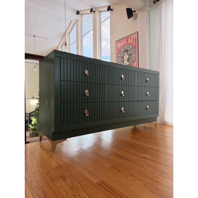 This Bassett mid-century modern piece has been fully restored and refinished in a rich, deep green sprayed finish that...