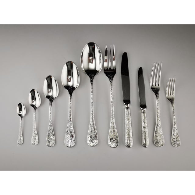 Rare 100-piece silver-plated cutlery set, "Jardin d'Eden" model, by Christofle Very good condition A few minor scratches...