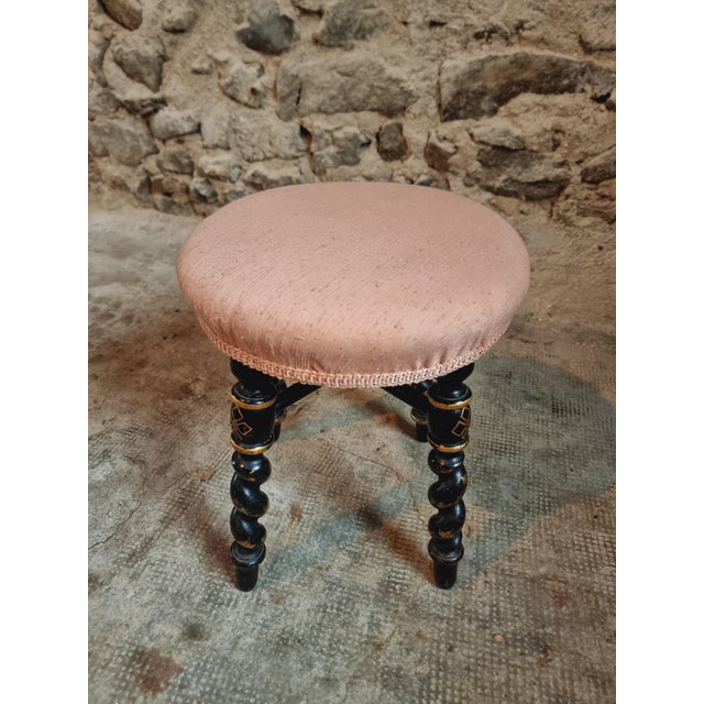 This Napoleon III stool from the 19th century is a refined and decorative piece that brings classic French style into any...